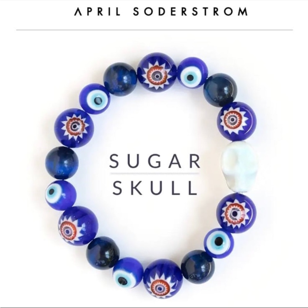 April Soderstrom sugar skull evil eye bracelet